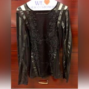 Women's mesh top with faux leather inserts and appliqué